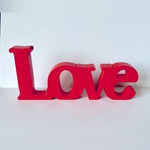 LOVE sign. 11” wide. Overall good condition.